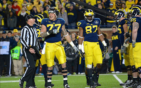 Taylor Lewan (77), Devin Funchess (87), Michael Schofield (75), and Kyle Bosch (65)
