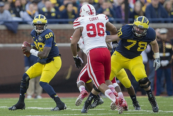 Devin Gardner (98) and Erik Magnuson (78)