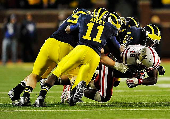 Jibreel Black (55), Courtney Avery (11), and Josh Furman (14)