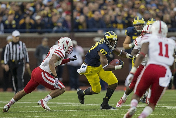 Devin Funchess (87) and Michael Schofield (75)