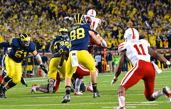 Graham Glasgow (61), Derrick Green (27), Devin Gardner (98), and Jake Butt (88)