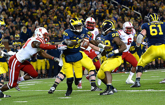 Devin Gardner (98), Fitzgerald Toussaint (28), and Graham Glasgow (61)