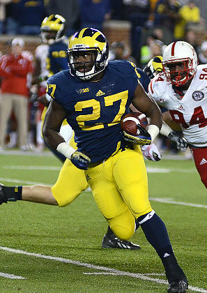 Devin Gardner (98) and Derrick Green (27)