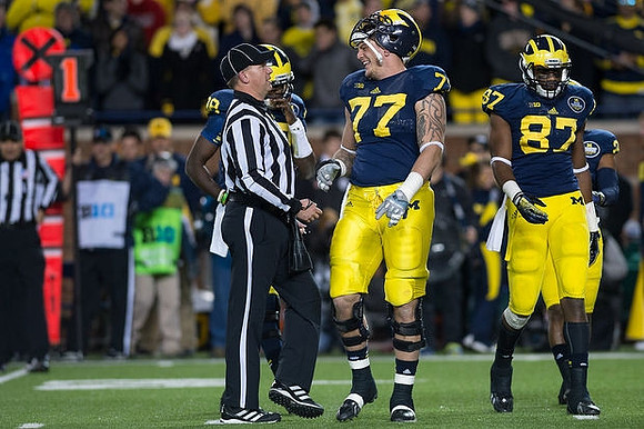 Devin Gardner (98), Taylor Lewan (77), and Devin Funchess (87)