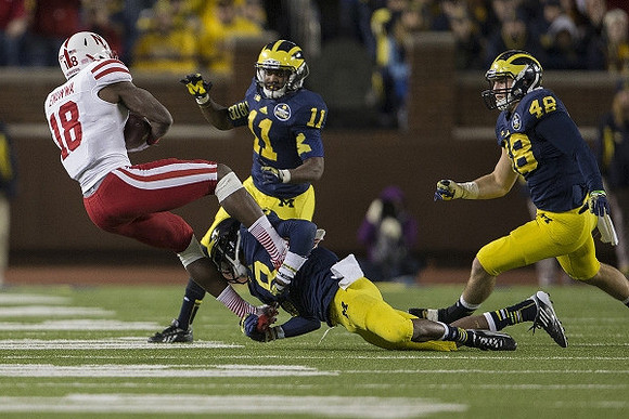 Courtney Avery (11), Channing Stribling (8), and Desmond Morgan (48)