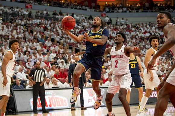 Zavier Simpson (3) and Franz Wagner (21)