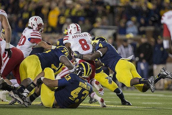 Quinton Washington (76), Chris Wormley (43), and Cameron Gordon (4)