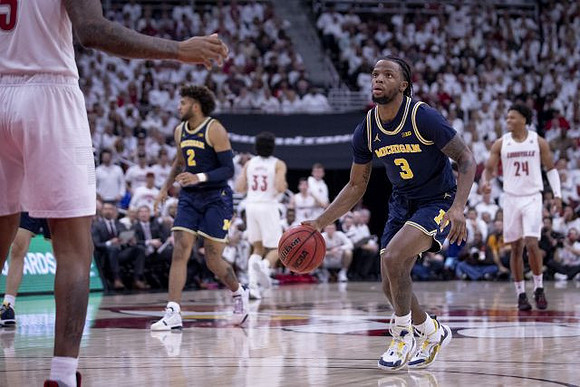 Isaiah Livers (2) and Zavier Simpson (3)