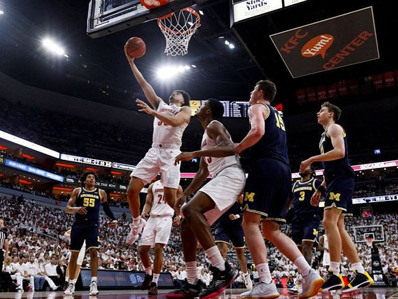 Eli Brooks (55), Jon Teske (15), Zavier Simpson (3), and Franz Wagner (21)