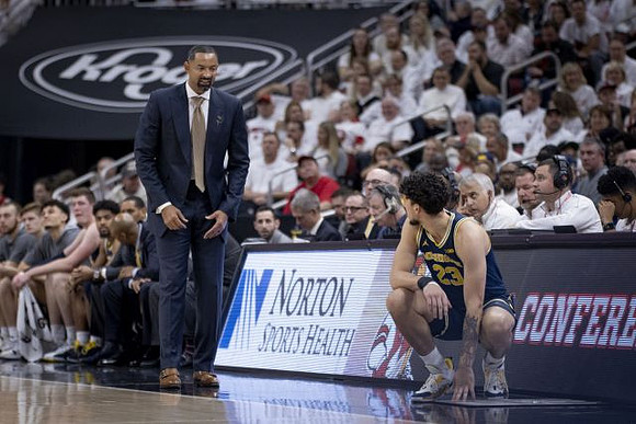 Juwan Howard and Brandon Johns Jr. (23)