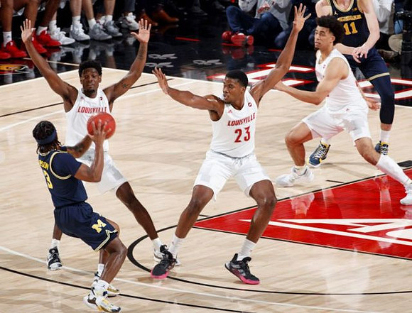 Zavier Simpson (3) and Colin Castleton (11)