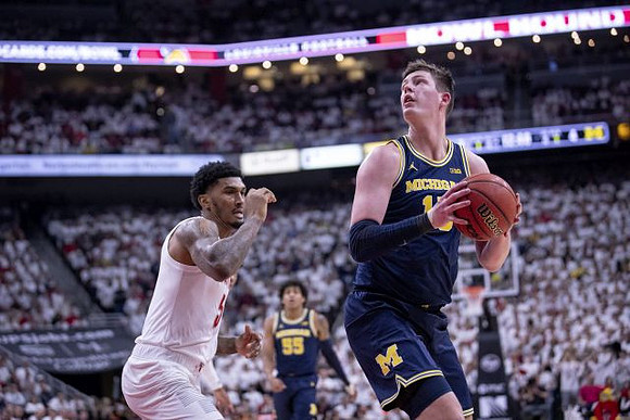 Eli Brooks (55) and Jon Teske (15)
