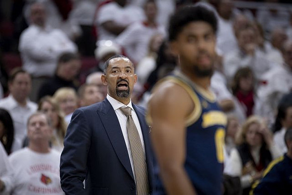 Juwan Howard and David DeJulius (0)