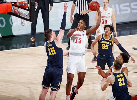 Jon Teske (15), Eli Brooks (55), and Franz Wagner (21)