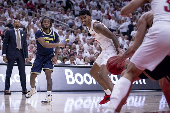Juwan Howard and Zavier Simpson (3)