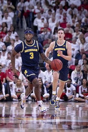 Zavier Simpson (3) and Franz Wagner (21)