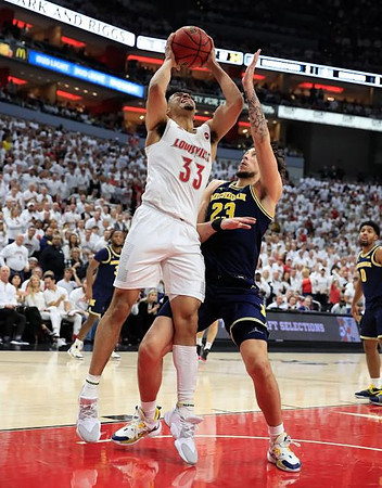 Brandon Johns Jr. (23) and David DeJulius (0)