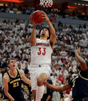 Franz Wagner (21) and Zavier Simpson (3)