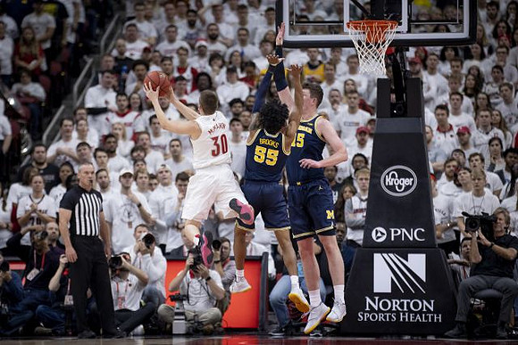 Eli Brooks (55) and Jon Teske (15)