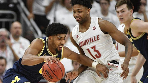 David DeJulius (0) and Colin Castleton (11)