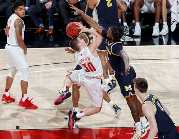 Eli Brooks (55), Zavier Simpson (3), and Colin Castleton (11)
