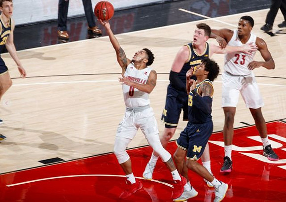 Franz Wagner (21), Jon Teske (15), and Eli Brooks (55)