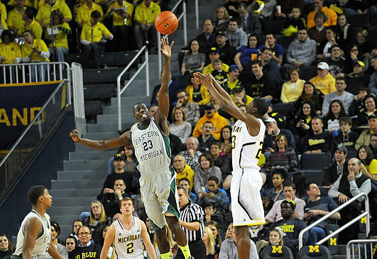 Spike Albrecht (2) and Caris LeVert (23)