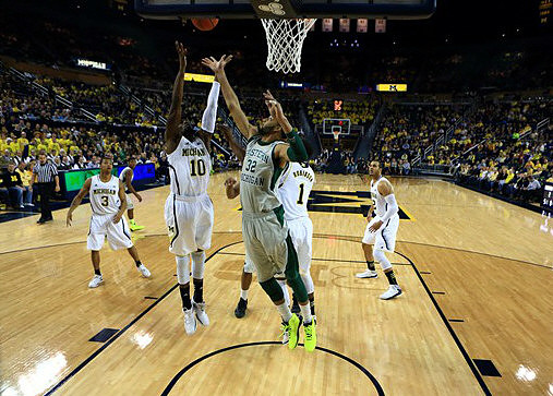Trey Burke (3), Glenn Robinson III (1), and Jordan Morgan (52)
