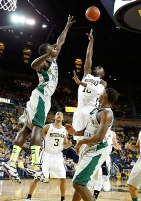 Trey Burke (3) and Tim Hardaway Jr. (10)