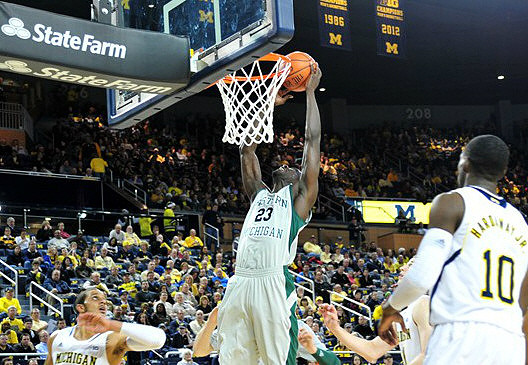 Jordan Morgan (52), Tim Hardaway Jr. (10), and Nik Stauskas (11)