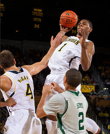 Mitch McGary (4) and Glenn Robinson III (1)