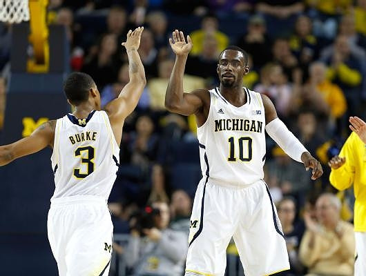 Trey Burke (3) and Tim Hardaway Jr. (10)