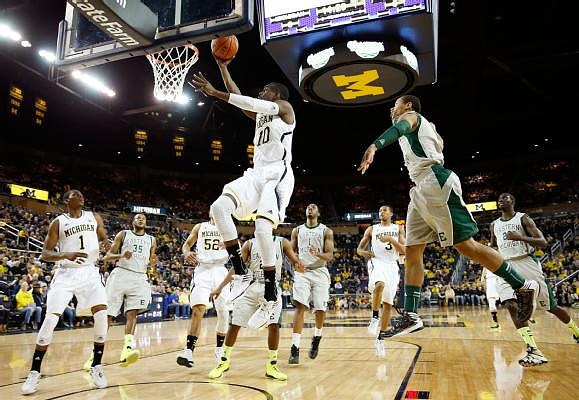 Glenn Robinson III (1), Jordan Morgan (52), Tim Hardaway Jr. (10), and Trey Burke (3)