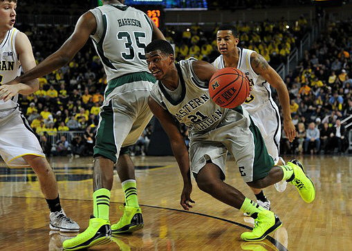 Matt Vogrich (13) and Mitch McGary (4)