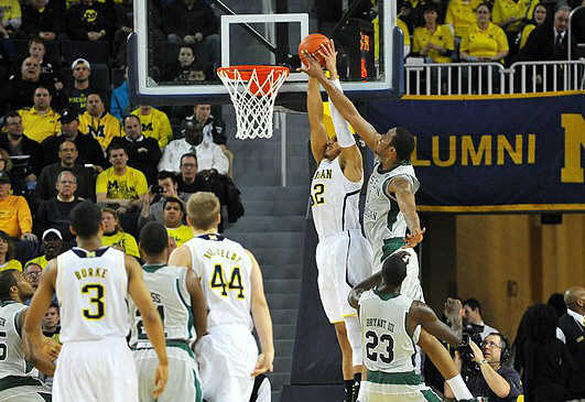 Trey Burke (3), Max Bielfeldt (44), and Jordan Morgan (52)