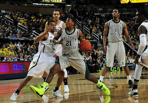 Trey Burke (3) and Jordan Morgan (52)