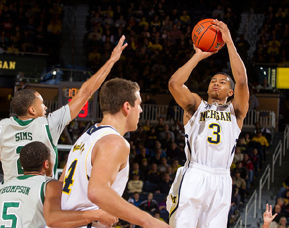 Trey Burke (3) and Mitch McGary (4)
