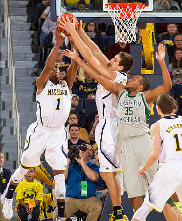 Glenn Robinson III (1), Mitch McGary (4), and Nik Stauskas (11)