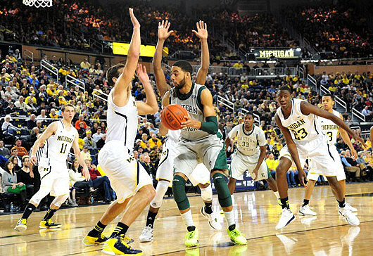 Nik Stauskas (11), Mitch McGary (4), Caris LeVert (23), and Trey Burke (3)
