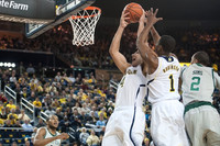 Mitch McGary (4) and Glenn Robinson III (1)