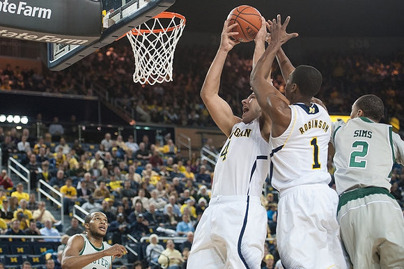 Mitch McGary (4) and Glenn Robinson III (1)