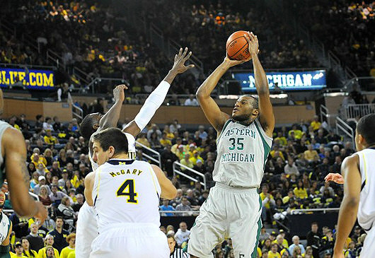 Mitch McGary (4), Tim Hardaway Jr. (10), and Trey Burke (3)