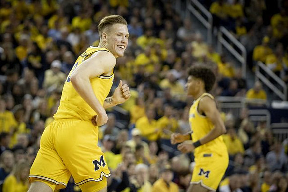 Ignas Brazdeikis (13) and Jordan Poole (2)
