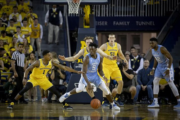 Charles Matthews (1), Ignas Brazdeikis (13), and Austin Davis (51)