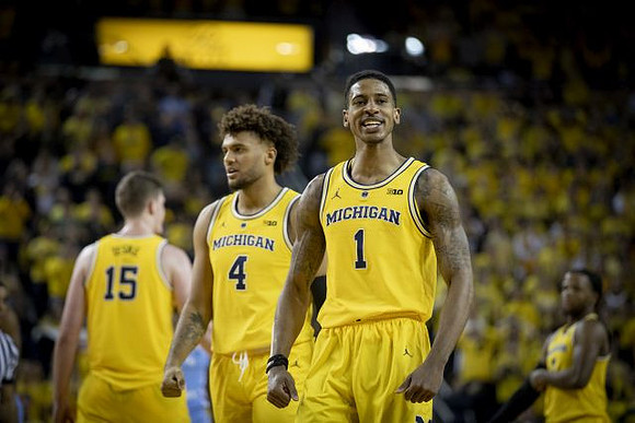 Jon Teske (15), Isaiah Livers (4), and Charles Matthews (1)