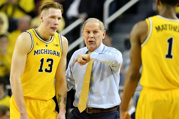 Ignas Brazdeikis (13), John Beilein, and Charles Matthews (1)