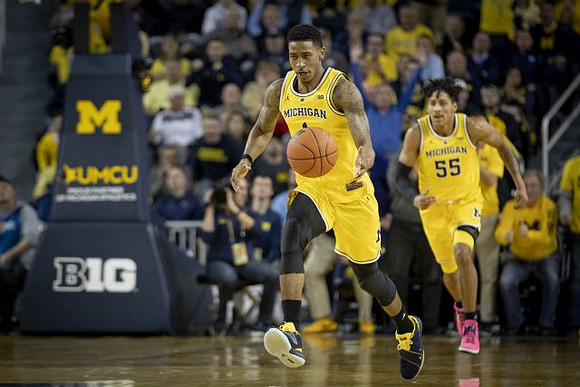 Charles Matthews (1) and Eli Brooks (55)