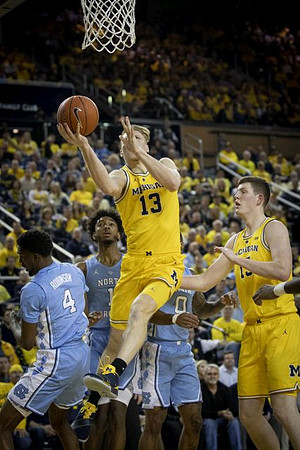 Ignas Brazdeikis (13) and Jon Teske (15)