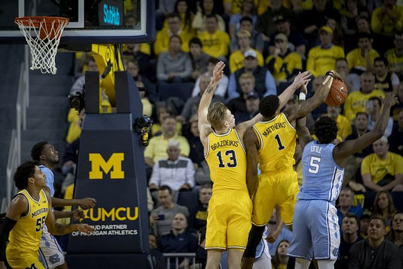 Eli Brooks (55), Ignas Brazdeikis (13), and Charles Matthews (1)