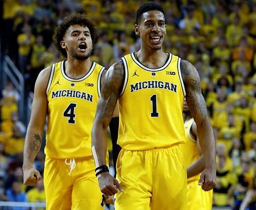 Isaiah Livers (4) and Charles Matthews (1)